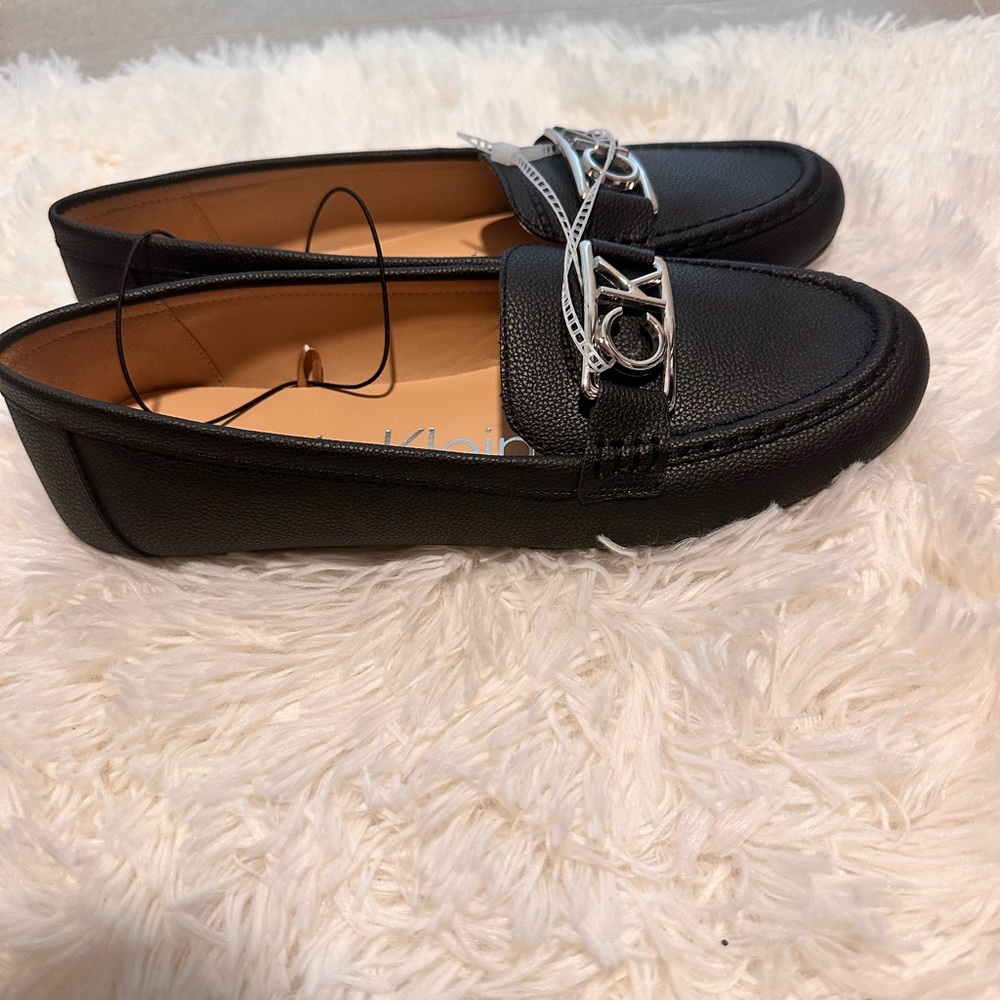 Calvin Klein Women’s Black Leather Loafers with Silver Accent